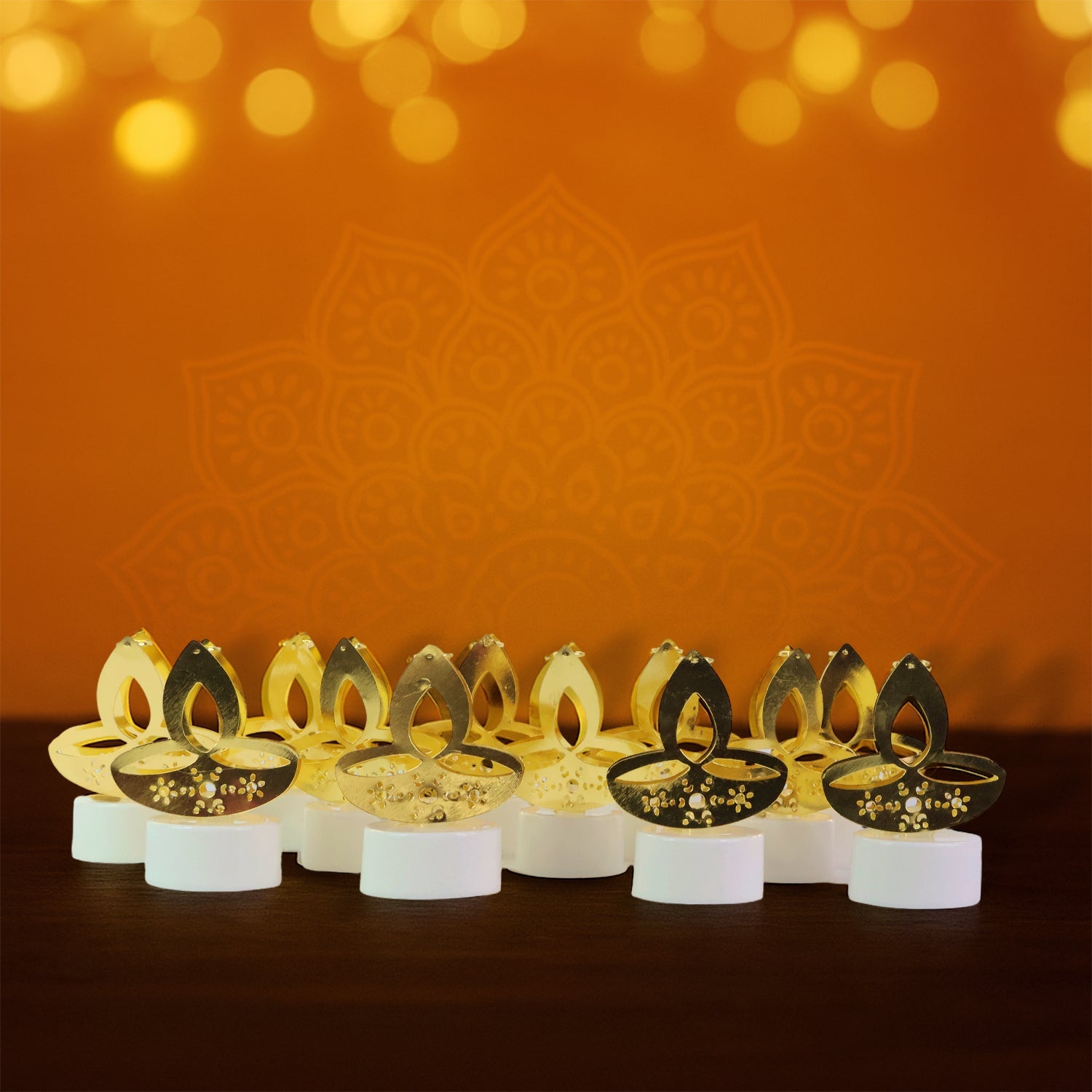 Golden Diya Shaped LED Tealight Candles (12 Pc) Golden Diya Shaped LED Tealight Candles (12 Pc)